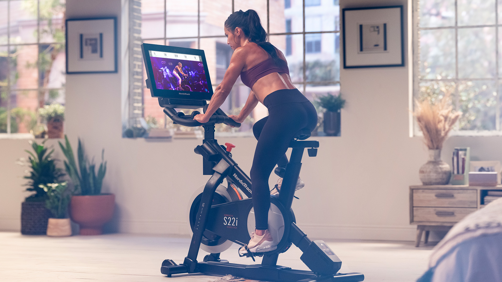 Woman working out on NordicTrack Indoor Cycle